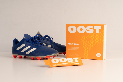 OOST ReGen & Recover carton with studded football boots