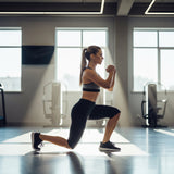 A fit woman performing a lunge, demonstrating the use of protein for muscle strength and maintenance.
